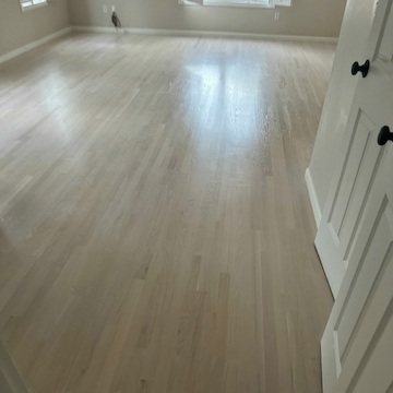 New hardwood floor installation with white stain in Scituate, MA - three coats water-based sealant by American Builder Hardwood Floor