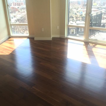 Hardwood floor refinishing in South Boston condo - sanded, stained, and sealed by American Builder Hardwood Floor