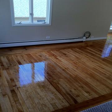 Sanding and refinishing hardwood floors in Boston area home - American Builder Hardwood Floor