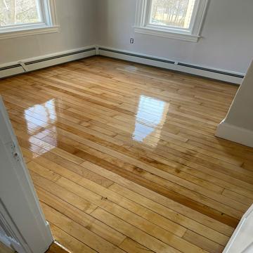 Hardwood floor installation with natural oil finish in Boston - American Builder Hardwood Floor